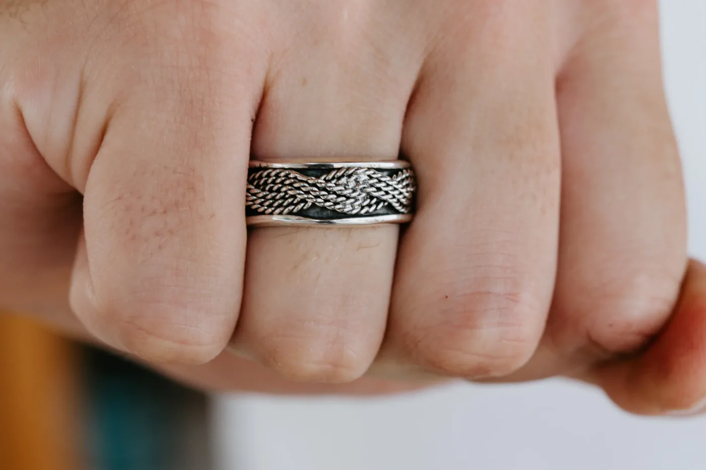 A hand-forged silver ring, worn straight from the bench